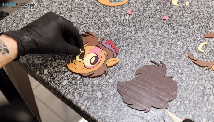 Solution découpe jet d'eau pièce en chocolat